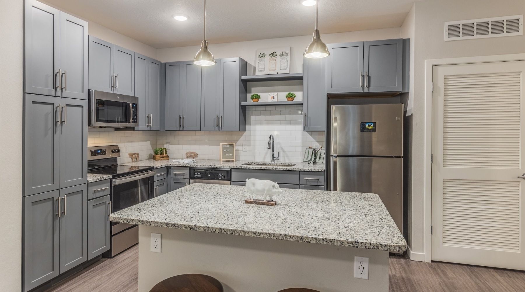 Beautiful kitchens with designer finishes Kitchen with grey cabinets