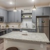 Kitchen with grey cabinets