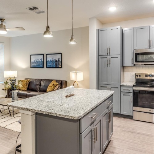 Beautiful kitchens with designer finishes a kitchen with a marble island